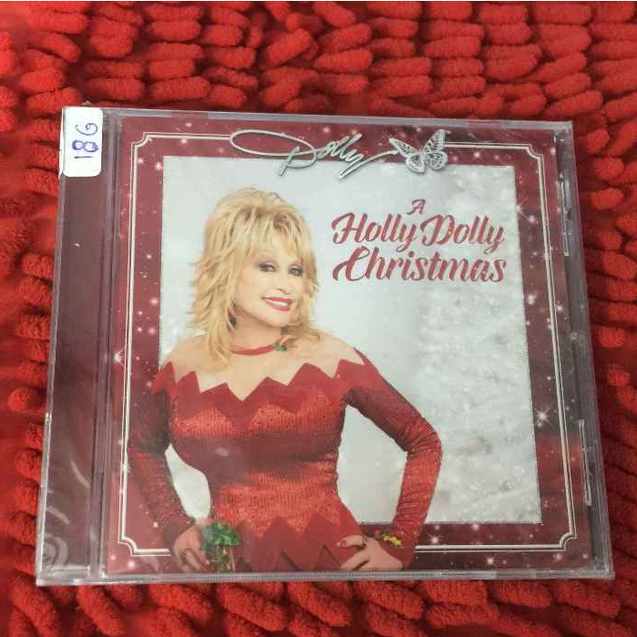 CDเพลงสากล Dolly Parton - A Holly Dolly Christmas สภาพตามปก SKU 23-12