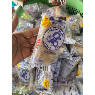 ( 10 แพ็ค แถมฟรี 2 ) ขนมตุ๊บตั๊บตรามังกร น้ำหนัก 50 กรัม