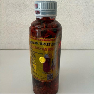 Minyak Urut Dayak Perisai Borneo 250 Ml. (สติกเกอร์มีรอยเปื้…