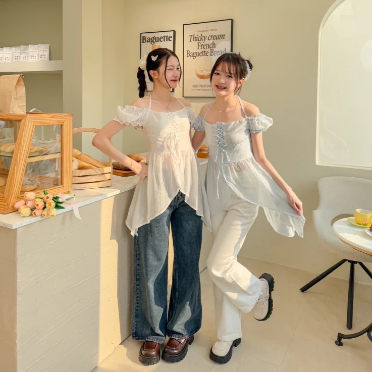 Jelly top : เสื้อแขนตุ๊กตาแต่งสายเดี่ยว เนื้อผ้าแก้ว ทรงแมงกะพรุน ร้อยเชือกปรับช่วงหน้าอกได้ KN.Clothes