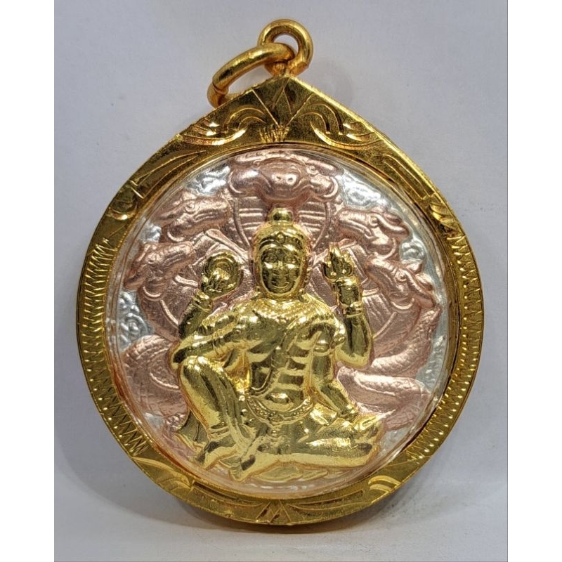 เหรียญจตุคามรามเทพ หลังพระแม่ธรณีบีบมวยผม สามกษัตริย์เลี่ยมพร้อมกรอบ