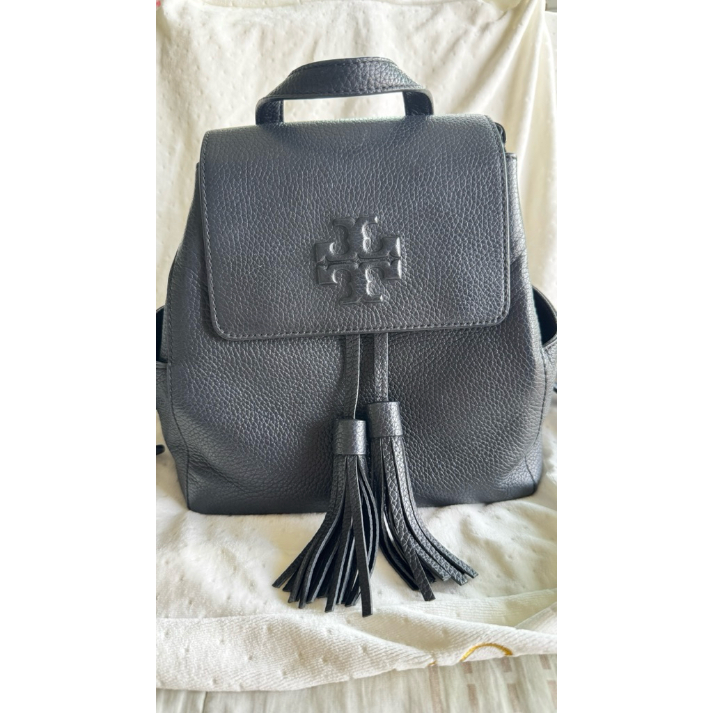 กระเป๋าเป้ Tory Burch Thea Black Pebbled Leather Mini Backpack Tassel 73134 รับประกันของแท้จากอเมริก
