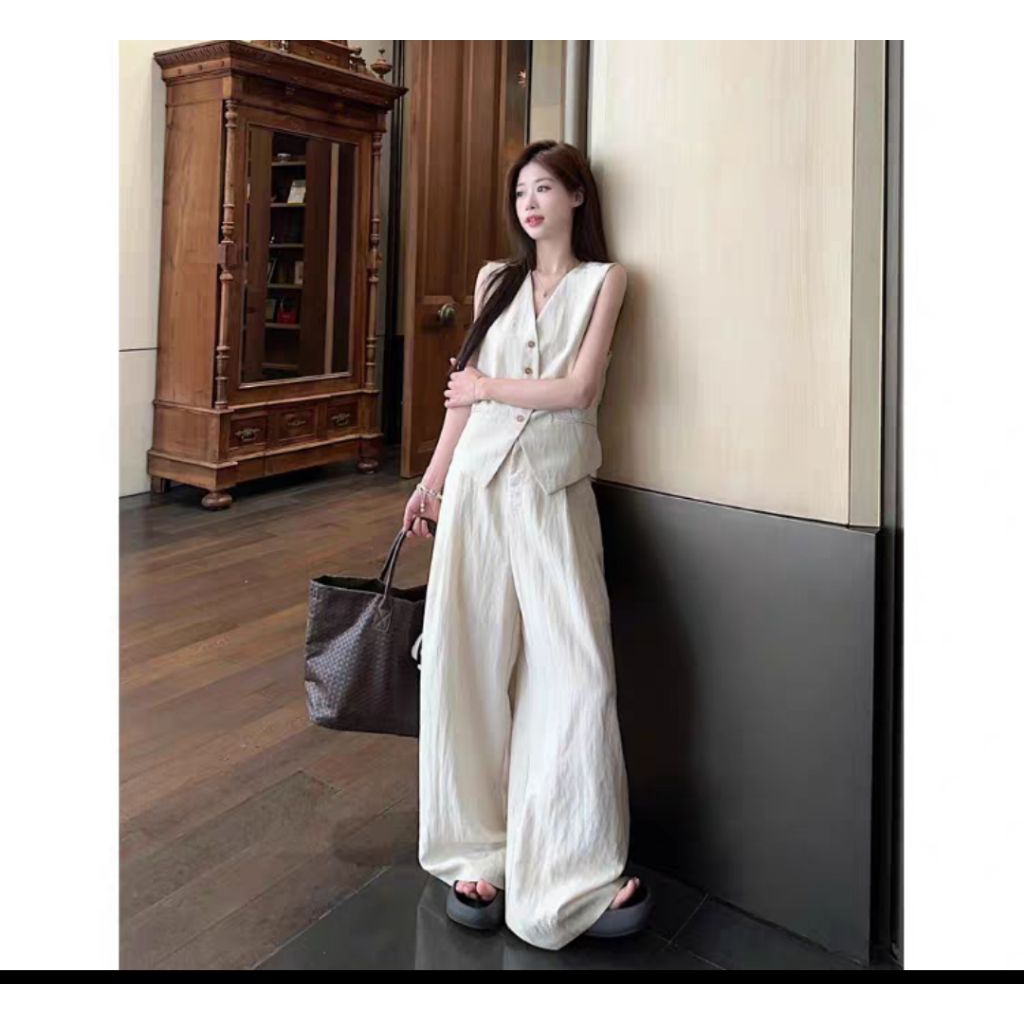 เซตเสื้อกั๊กทรงหลวมสไตล์ Old Money หรูหราดูดี พร้อมกางเกงเอวสูงขากว้าง ฤดูร้อน ชุดเซตที่ดูสุภาพและมีรสนิยม