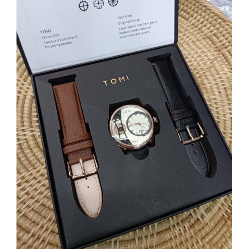 นาฬิกาแบรนด์ TOMI แบรนด์แท้ แพคเกจแม่เหล็ก พร้อมสายหนัง 2 เส้น นาฬิกาควอทซ์ นาฬิกากันน้ำ ขนาดหน้าปัด 4CM.