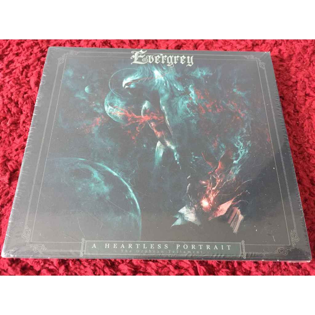 CD ซีดีเพลงสากล Evergrey - A Heartless Portrait - The Orphean Testament - สภาพตามรูปปกMaizui