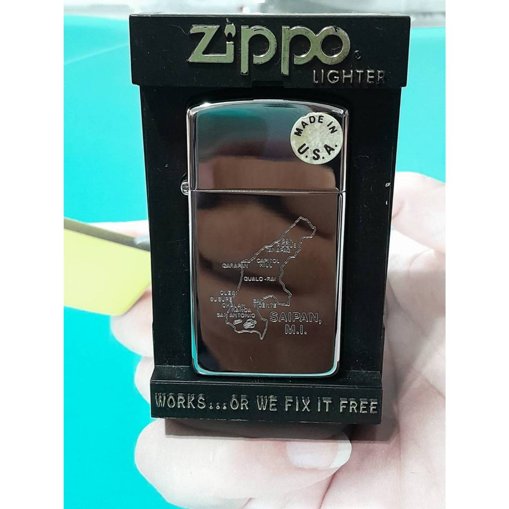 zippo saipan m.l. ผลิตปี 1988 ถังในตรงปี  ขนาด slim   สีเงิน  ผิวโครเมียมขัดเงา ลายแกะลงเนื้อ ของใหม