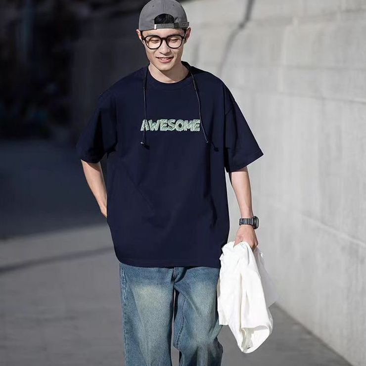 เสื้อยืดแขนสั้นผู้ชายย้อนยุคอเมริกันพิมพ์เทรนด์แฟชั่นแขนสั้นเสื้อยืดลำลองหลวม ๆ สำหรับผู้ชาย