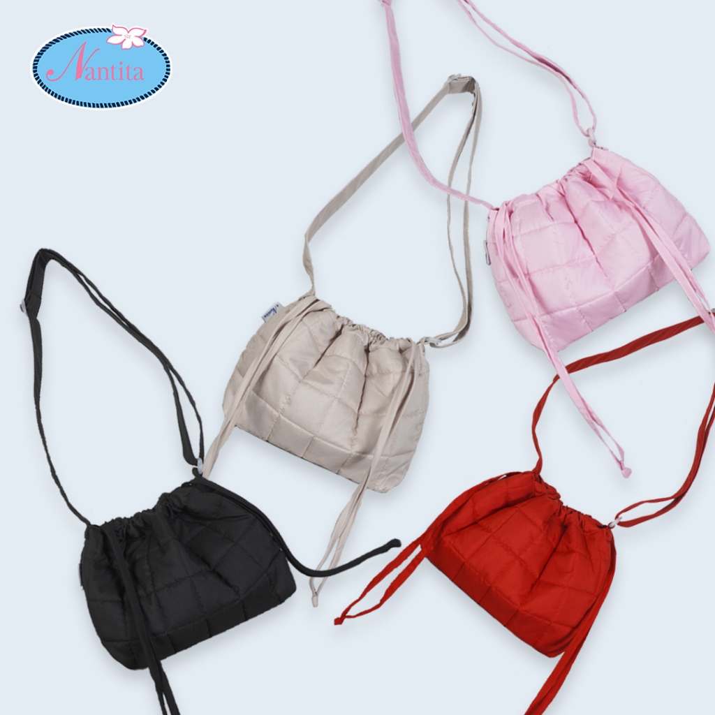 Nantita กระเป๋านุ่มนิ่มปากรูดใบเล็กคอสบอดี้ KA007