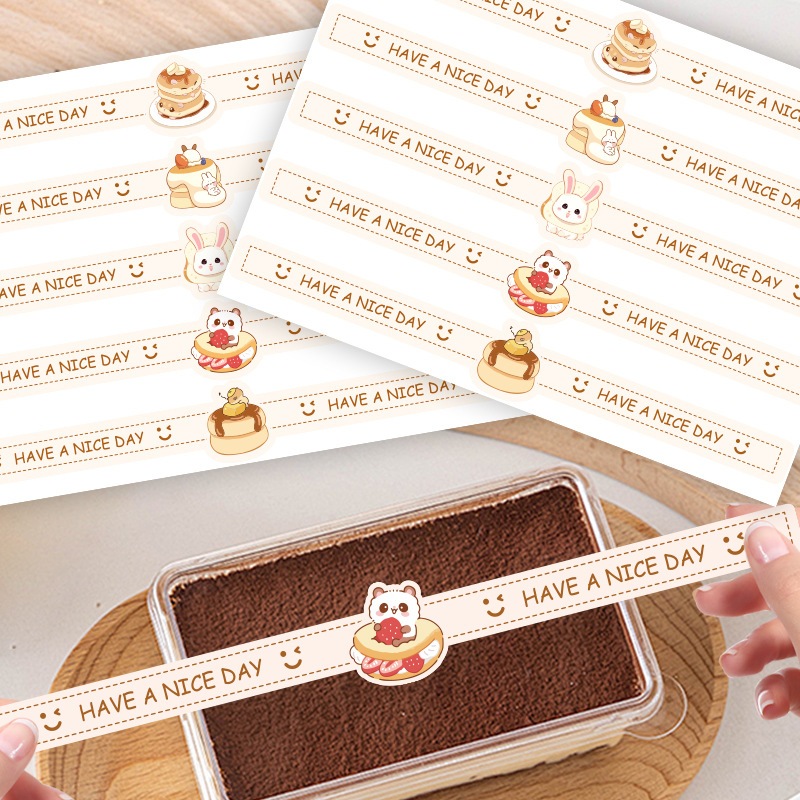 ( hh ) สติกเกอร์แถบยาว คาดกล่องบิสกิต คาดกล่องเค้ก สติกเกอร์ปิดผนึกตกแต่ง ยาว 24 ซม. ( 50 ดวง/แพค )