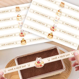 ( hh ) สติกเกอร์แถบยาว คาดกล่องบิสกิต คาดกล่องเค้ก สติกเกอร์ปิดผนึกตกแต่ง ยาว 24 ซม. ( 50 ดวง/แพค )