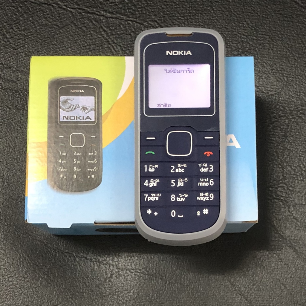 Nokia 1202 โทรศัพท์ลูกอมคลาสสิกปุ่มเก่าพร้อมปุ่มไฟฉายนักเรียนผู้สูงอายุผู้สูงอายุเครื่องสแตนด์บายนาน