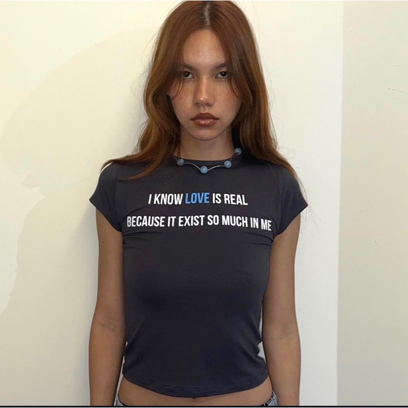 LOVE IS REAL BABY TEE