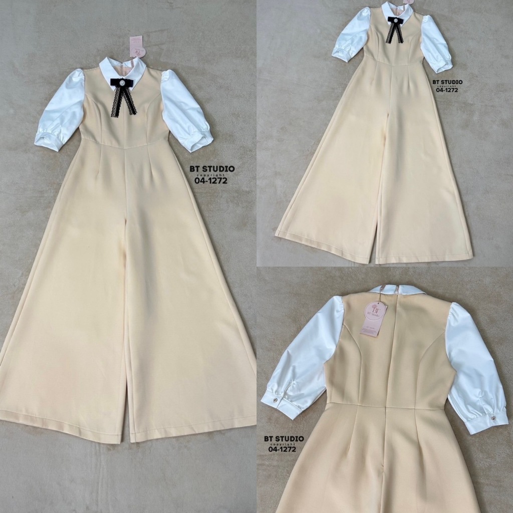 BT 04-1272 จั้มสูทขายาวดีเทลชุดยาวสีครีมเย็บติดคอปกมาพร้อมตัดแขนสีขาว โบเข็มกลัดที่ตรงกลางคอ มีซับใน