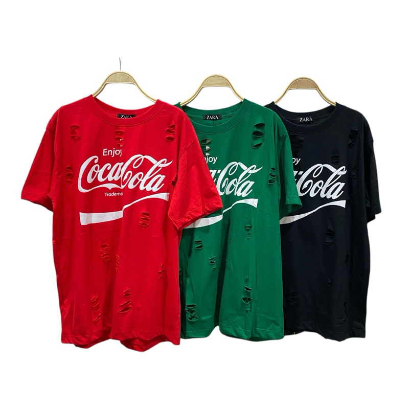 เสื้อยืดคอกลม ลายโค้กแต่งขาดแนววินเทจผ้าใหม่