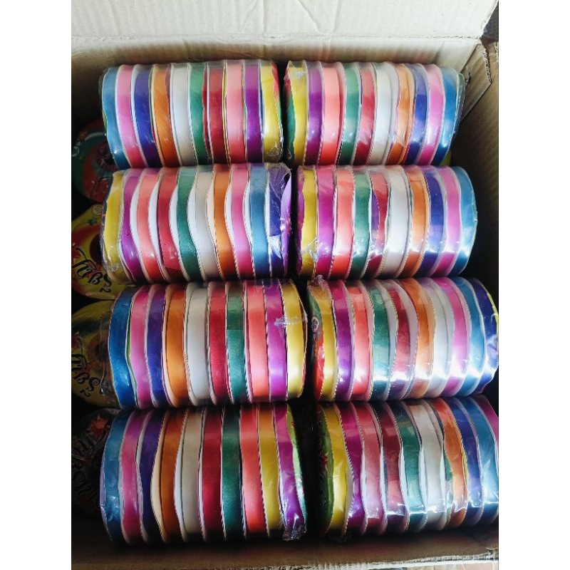 ริบบิ้นห่อเหรียญ คละสี เบอร์2 ตราดอกไม้ (1แพค10ม้วน)