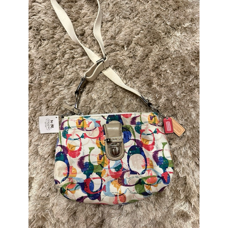 (New) กระเป๋า Coach - POPPY STAMPED C SWINGPACK CROSSBODY Multicolor