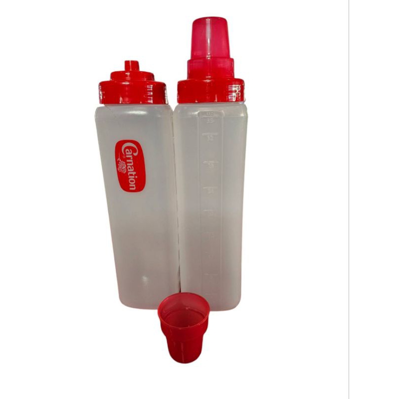 ขวดบีบนมขนหวานคาร์เนชั่นขนาด1000ml.  35oz.