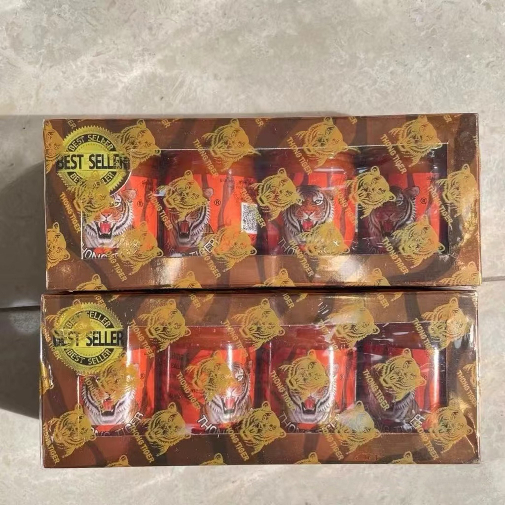 ยาหม่องทองไทเกอร์ พรีเมี่ยม**แพ็ค4ขวด** THONG TIGER BALM Premium สูตรร้อน