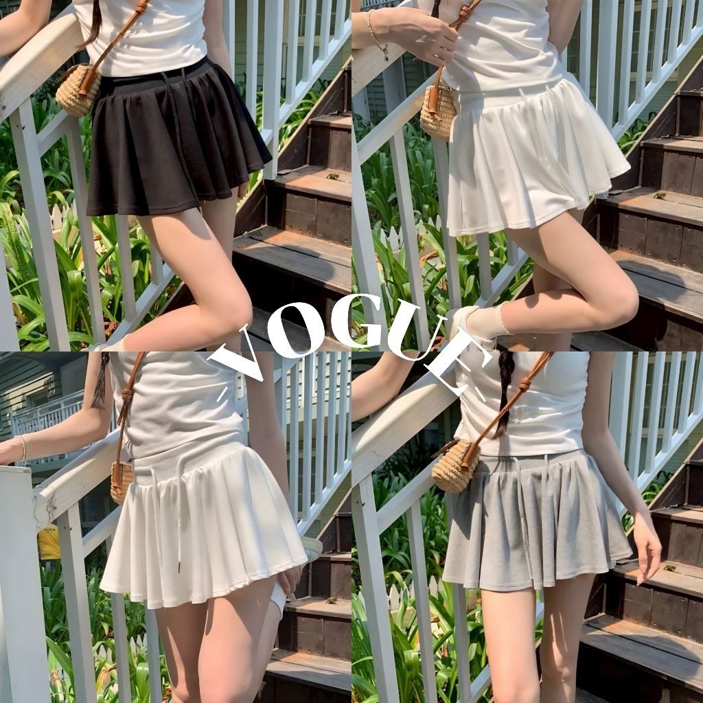 Vogue พร้อมส่ง กระโปรงขาสั้น เอวสม๊อคยืด ปลายปล่อยสีพื้น (FY2871)