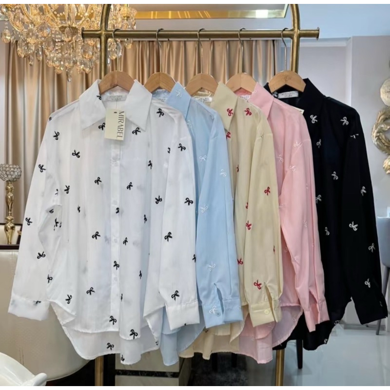 เสื้อเชิตแขนยาว Over size ปักโบว์รอบตัว (หน้าสั้นหลังยาว)