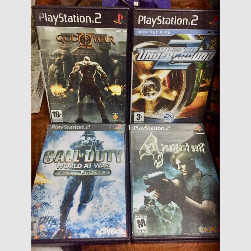 รวมแผ่นเกมส์ (ps2 ได้ 4แผ่น) call of duty + resident 4 + andergrounng + god of war ✅