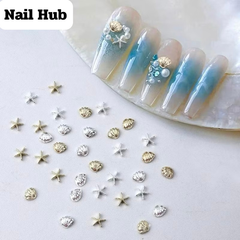 AC.1072 ร้านไทย แพ็ค 2 ชิ้น พร้อมส่ง อะไหล่แต่งเล็บลายหอยและปลาดาว มีให้เลือก 2 สี เงิน-ทอง