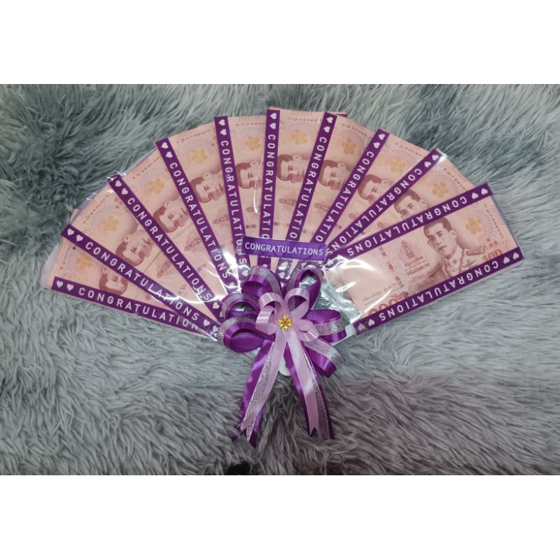 พ้ดใส่ธนาบัตร. 10 ใบ. ด้านหลังใช้พัดจริง - รูปที่ 2