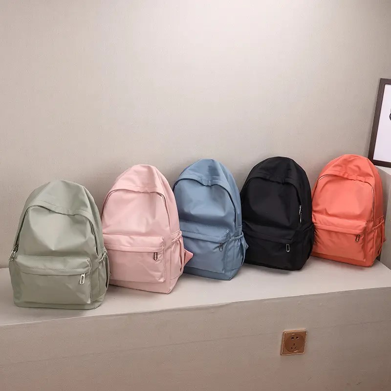 มาถึงภายใน 3 วัน กระเป๋านักเรียนสไตล์เกาหลีสีเรียบง่ายความจุขนาดใหญ่กระเป๋าเป้สะพายหลังไนลอน [ไม่มีจี้]
