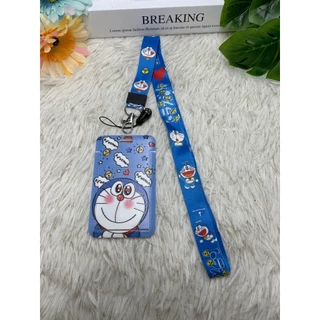 กระเป๋าใส่นามบัตร บัตรประจําตัวประชาชน พิมพ์ลายโดราเอมอน แบบสายคล้องคอ พับเก็บได้ สําหรับนักเรียน
