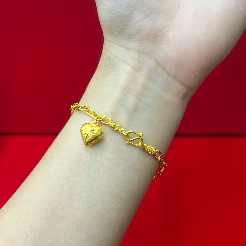 สร้อยข้อมือ ลายโซ่ฝรั่ง น้ำหนัก 2 สลึง ปลายเชื่อมหัวจรวด ห้อยหัวใจ 1 จุด ยาว 6.5 นิ้ว