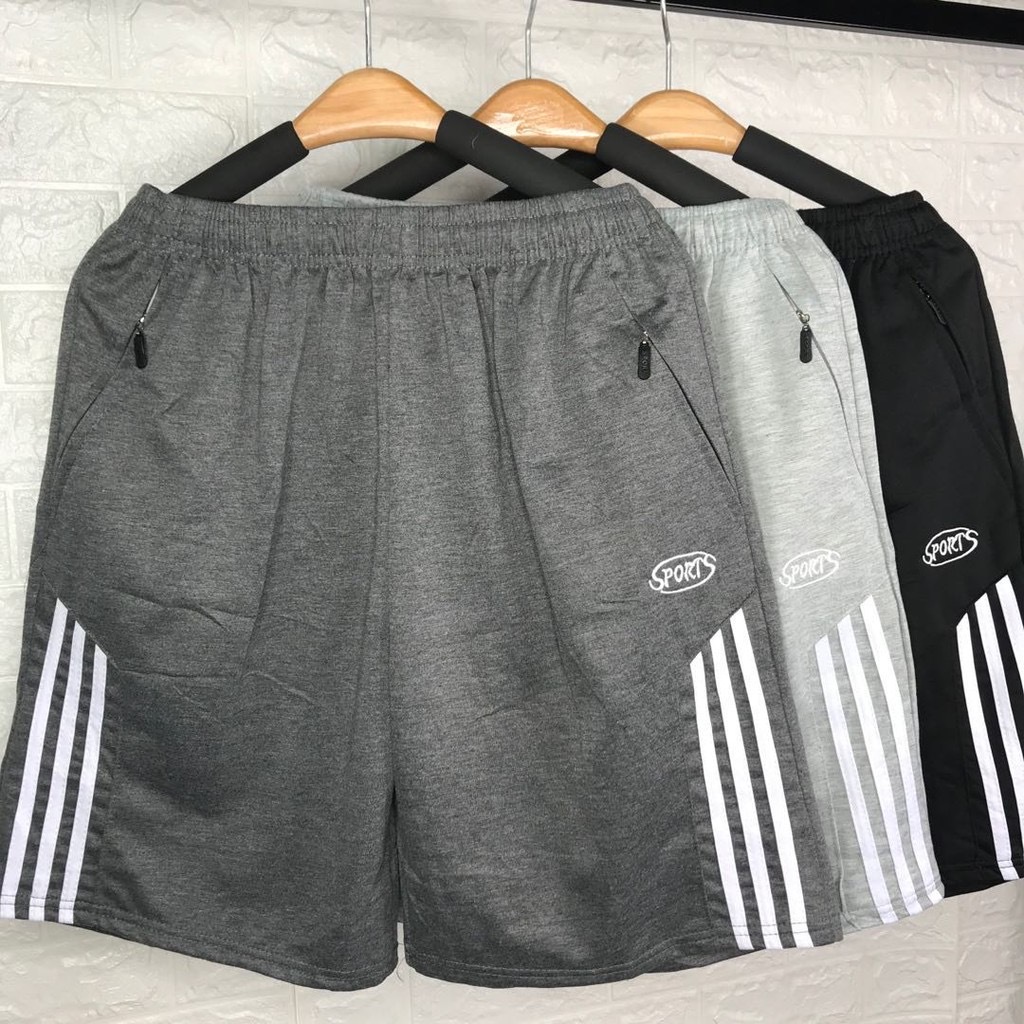 กางเกงขาสั้นผู้ชาย กางเกงวอร์มขาสั้น ฟรีไซส์เป็นเอวยางยืด กระเป๋ามีซิป แบบสวมใส่สบาย