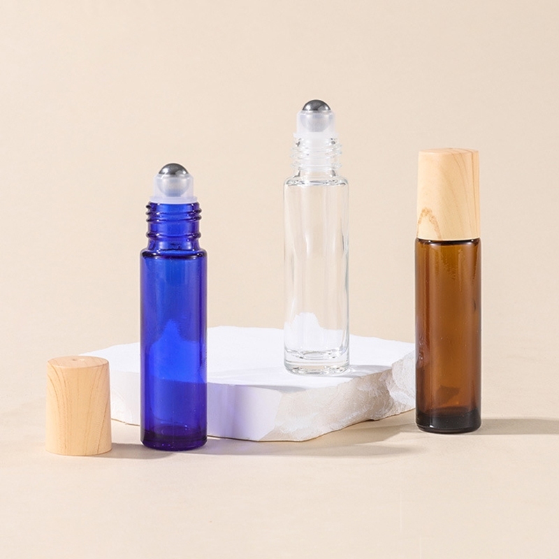 (แพ็ค 10 ชิ้น) ขวดแก้วหนา หัวลูกกลิ้งเหล็ก ฝาลายไม้ ขนาด 5-10 ml. #P436 ขวดใส่น้ำมัน น้ำหอม รีฟิล พกพา PackingDD