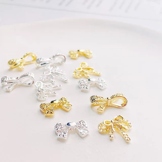 อะไหล่โบว์เพชรเงิน-ทอง ตกแต่งหน้าเล็บ 10 ตัว/ห่อ สินค้าพร้อมส่ง