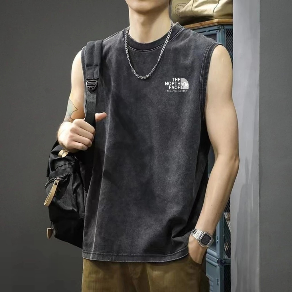 UT shop เสื้อกล้าม oversize ผ้าฝ้าย100% เสื้อแขนกุด แฟชั่น แนวสตรีท 'THE NOPTH FAOE' เสื้อ ผู้ชาย เสื้อสีขาว เสื้อแขนกุด