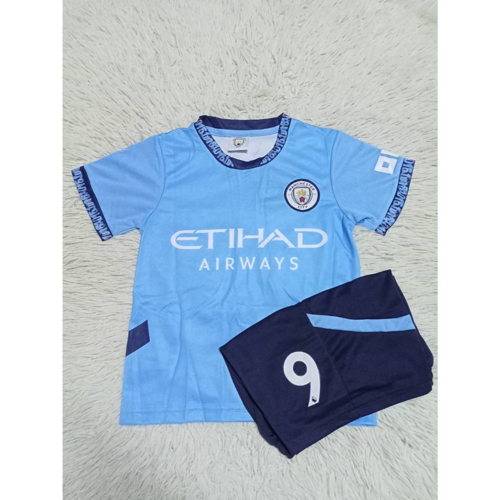 เสื้อกีฬาฟุตบอลเด็ก สโมสรเเมนเชสเตอร์ซิตี้ พิมพ์ชื่อฮาเเลนด์เบอร์9 ปี2024-2025ใหม่ล่าสุด เสื้อ+กางเกง