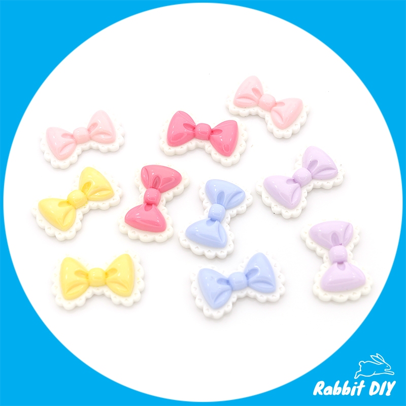 เรซิ่น โบว์ มีหลายสี ระบายขอบสีขาว (แพ็กรวมทุกสี 10 ชิ้น)
