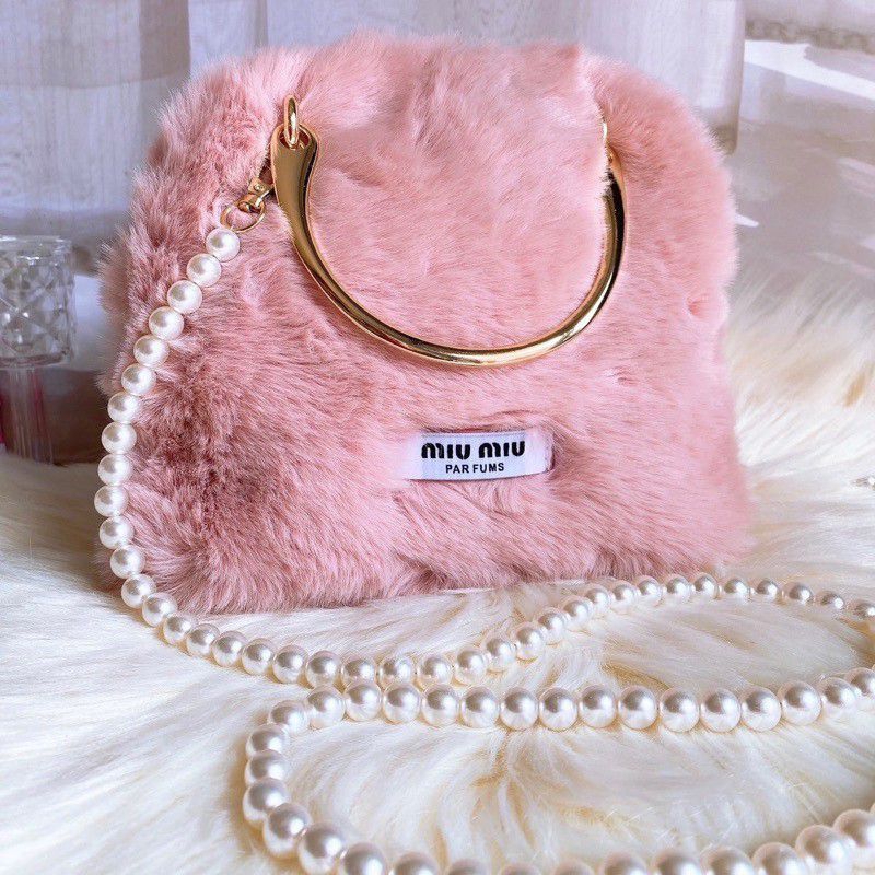 กระเป๋าเครื่องสำอาง miu miu