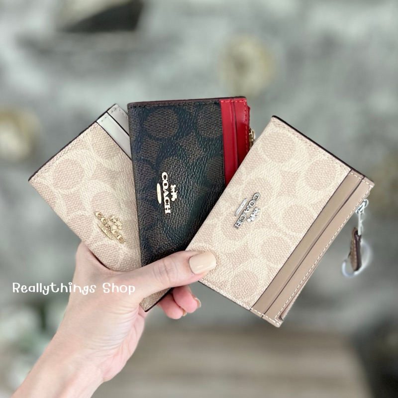 [ลดเพิ่ม:โค้ดคุ้ม+โค้ดร้านค้า]{แท้ % พร้อมส่ง+ส่งฟรี} กระเป๋าใส่บัตร(มีซิป+พวงกุญแจ)C0ACH Mini ID Skinny