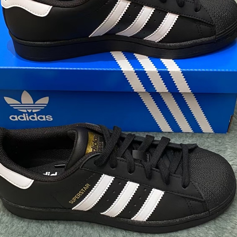 Adidas Originals SUPERSTAR รองเท้าผ้าใบหุ้มข้อต่ำสำหรับผู้ชายและรองเท้าลำลองสำหรับผู้หญิง กันลื่น ดูดซับแรงกระแทก