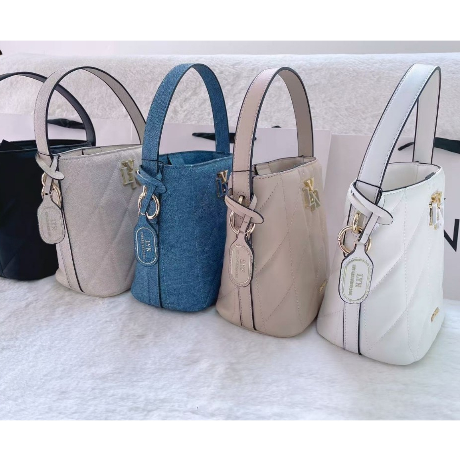กระเป๋าทรงถัง LY   N ขนาด 8 นิ้ว สายสะพาย 2 สาย มี 5 สี ใช้งานแบบถือ เเละ สะพายข้าง อุปกรณ์ ป้ายห้อย สินค้าพร้อมส่ง รูปที่ 2