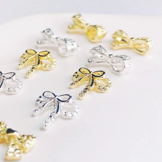 อะไหล่โบว์เพชรเงิน-ทอง ตกแต่งหน้าเล็บ 10 ตัว/ห่อ สินค้าพร้อมส่ง