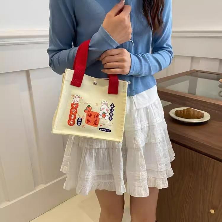 Fashion กระเป๋าถือ ผ้าแคนวาส ลายการ์ตูน น่ารักๆ  สไตล์เกาหลี มี2ขนาดให้เลือก พร้อมส่งจากไทย B-860
