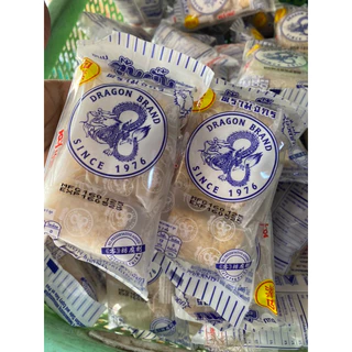 ( 10 แพ็ค แถมฟรี 2 ) ขนมตุ๊บตั๊บตรามังกร น้ำหนัก 50 กรัม