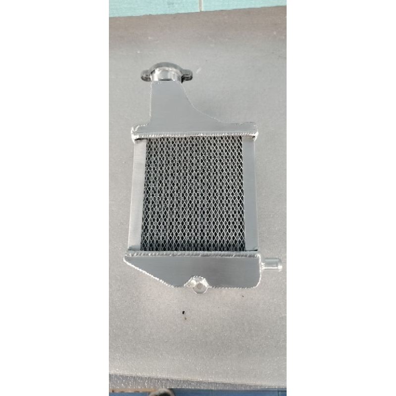 GPXDRONE หม้อน้ำแต่ง หม้อน้ำแต่งผลิตจากอลูมิเนียมทั้งอันช่วยในการระบายความเย็นดีขึ้นกว่าของเดิมเพราะ