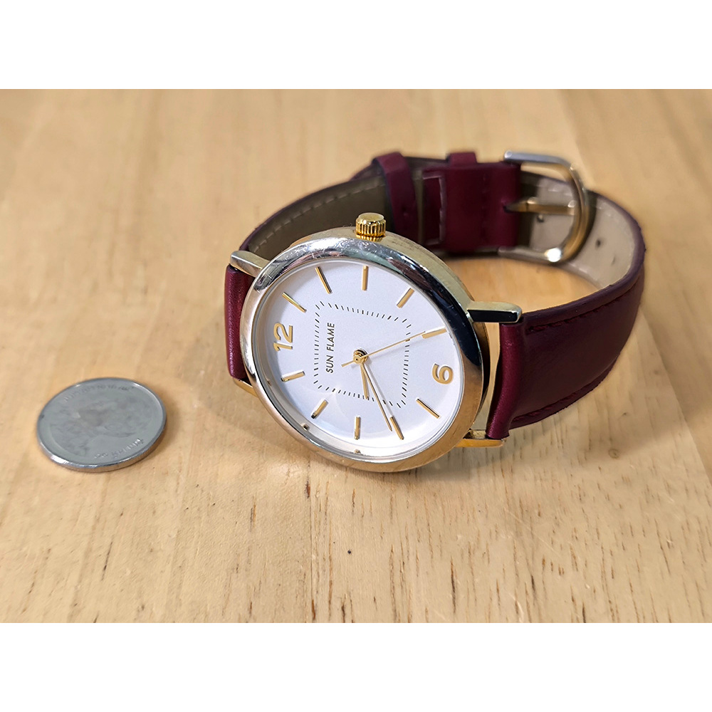 นาฬิกามือสอง SUN FLAME เรือนทองอ่อน สายหนังน้ำตาลแดง
