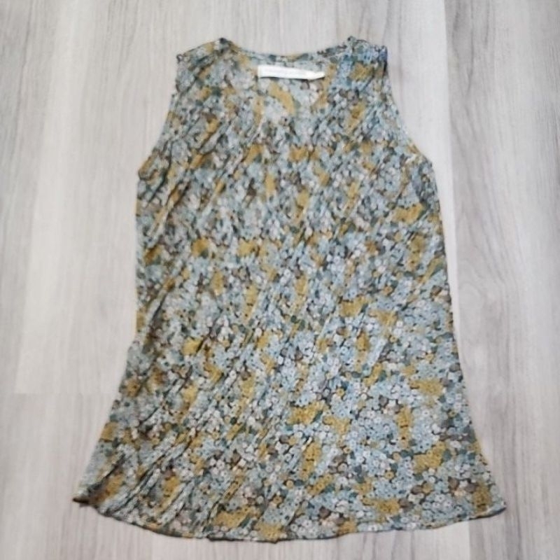 เสื้อแขนกุดยี่ห้อ Flynow