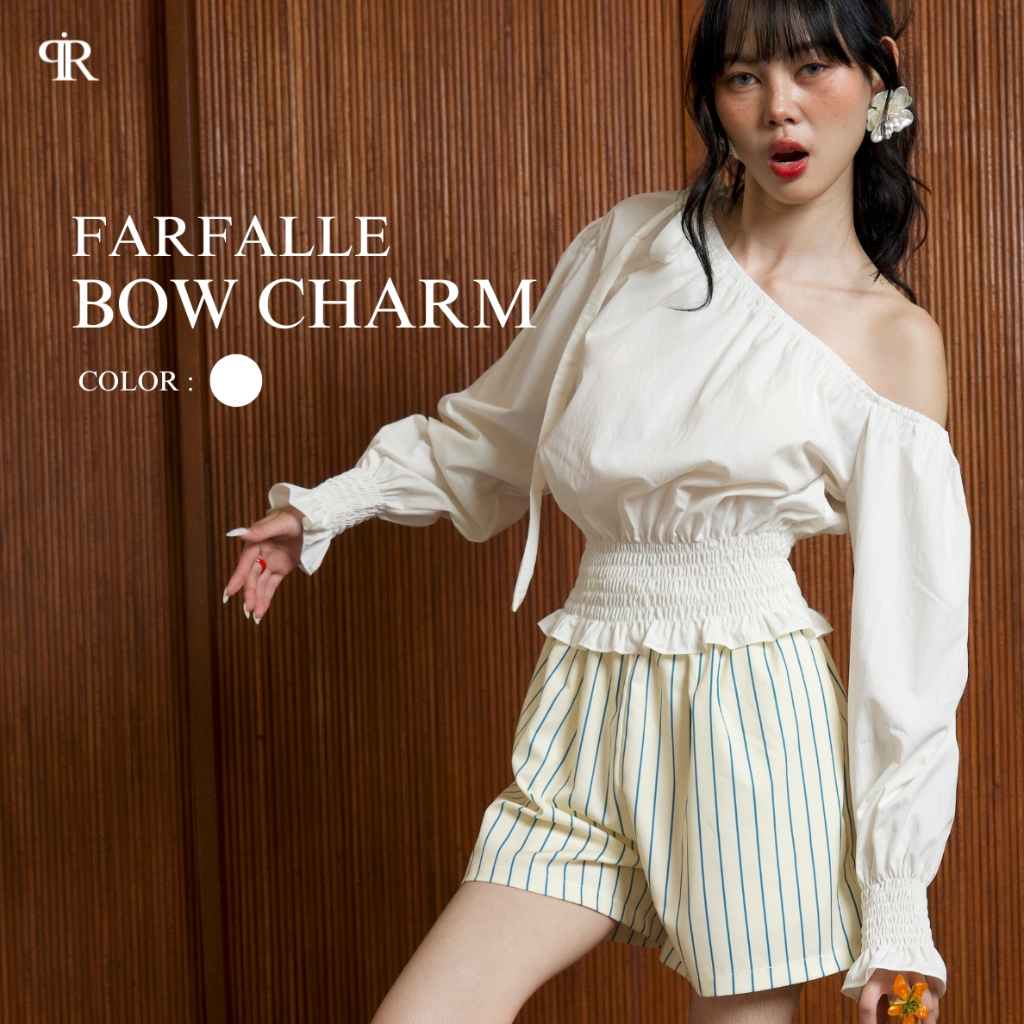 Panchitar Farfalle Bow Charm – เสื้อแขนยาวปาดไหล่ ดีเทลจั้มแขนและเอว พร้อมโบว์สุดน่ารัก