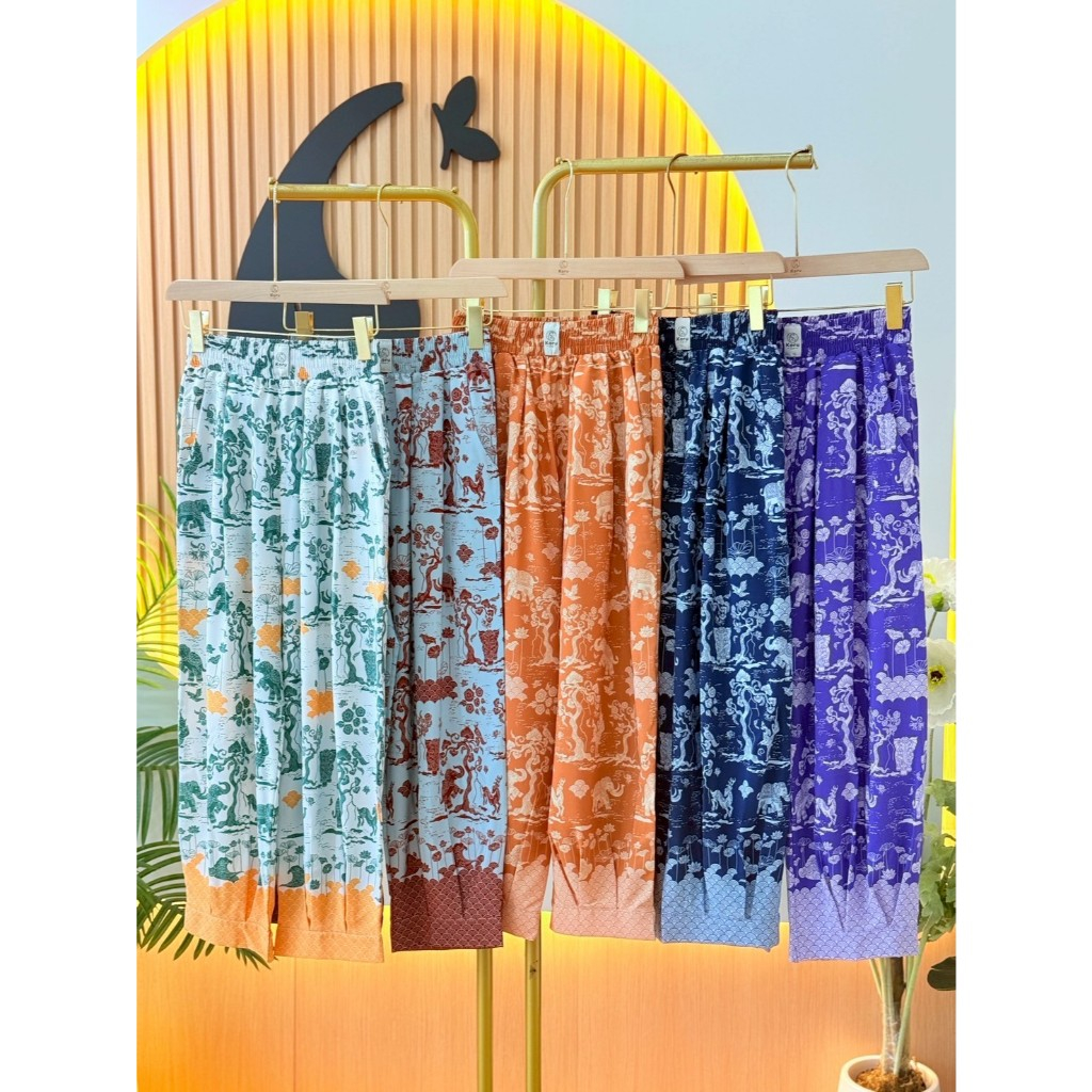 KORU กางเกงขาจีบ ลายช้างหิมพานต์