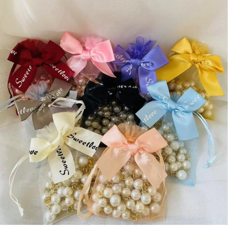 ✅ราคาโรงงาน✅ถุงผ้าแก้ว โปร่งใส หูรูด ติดโบว์น่ารัก มีหลายสี หลายขนาด พร้อมส่งในไทย