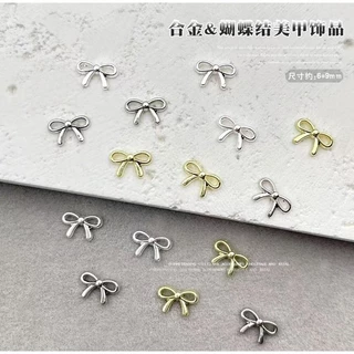 B2.อะไหล่โบว์ตกแต่งเล็บ หนึ่งถุงมี 10 ตัวต่อ ขนาดกลาง สวย ๆ ค่ะ พร้อมส่งจากไทยแลนด์ ปู้นๆ